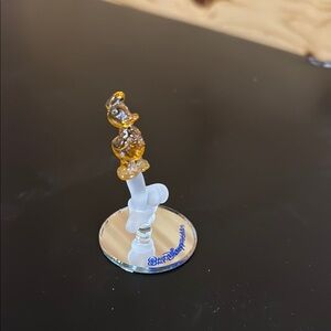 Gold and White Decorative Accent with Curved Glass Design